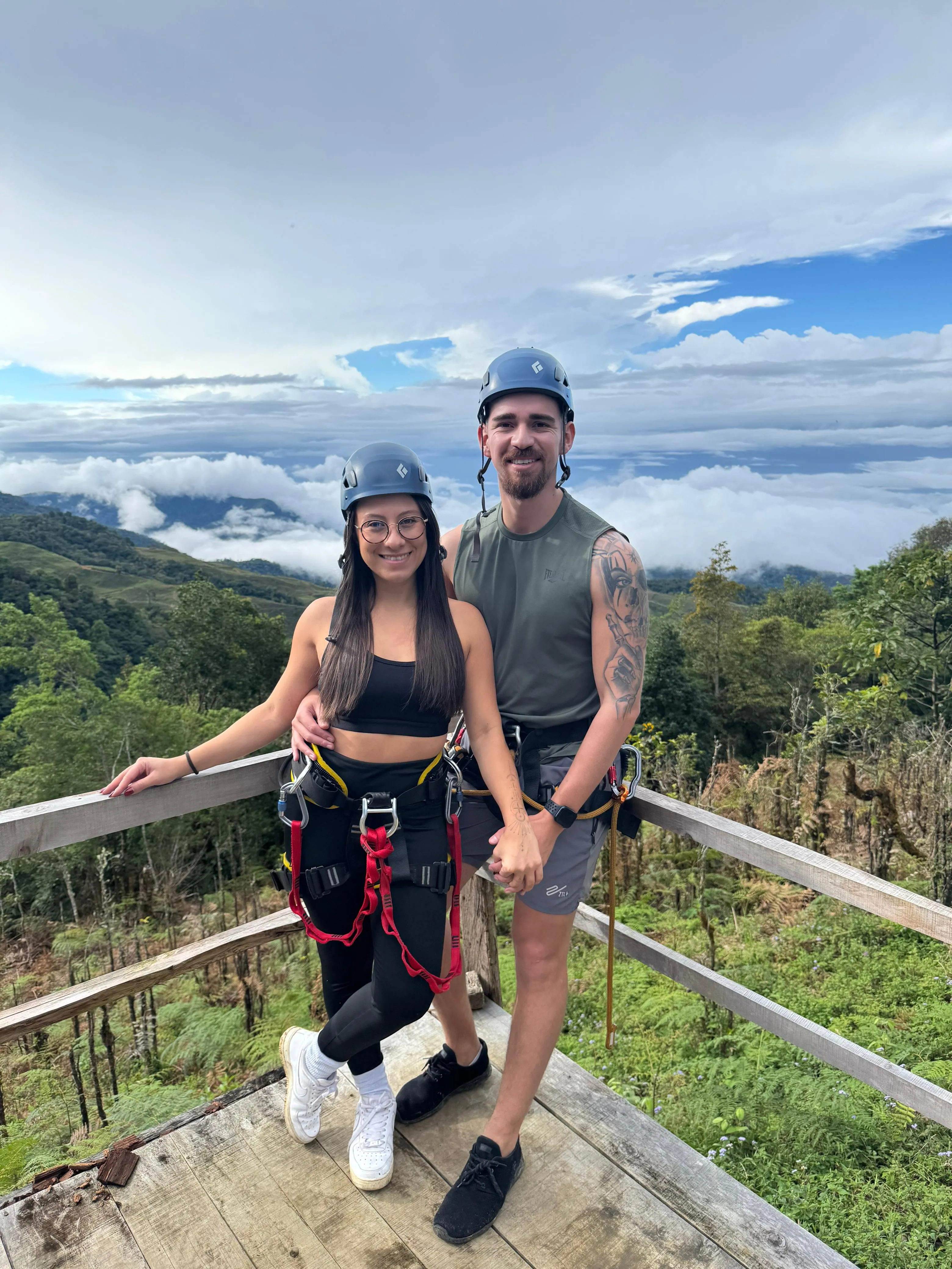 couple smiling from a lookout